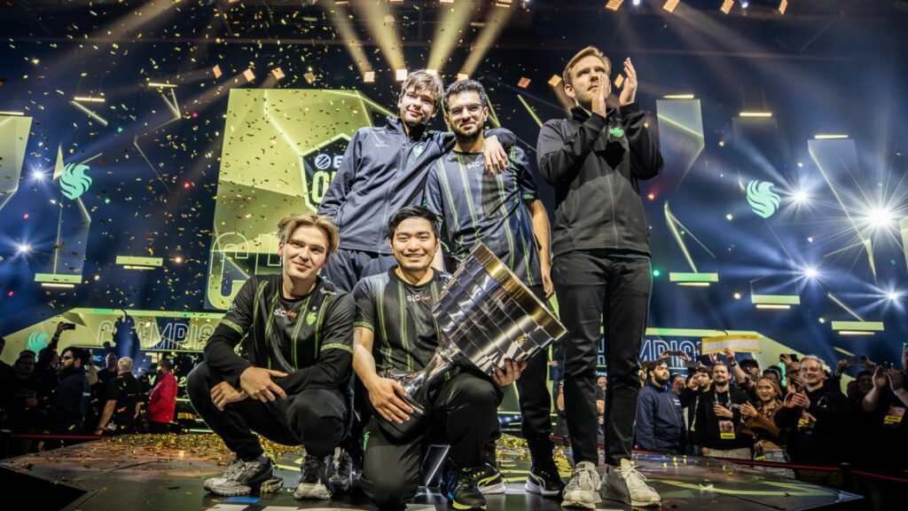 Team Falcons pose with their trophy after winning the ESL One Birmingham 2024