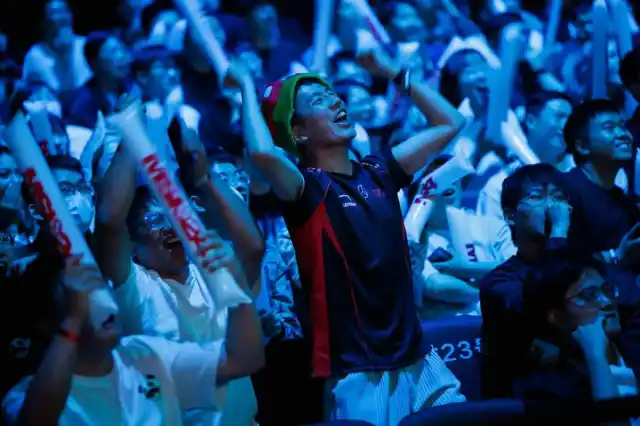 Fans cheering in the audience at MSI 2024.