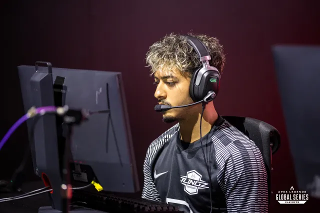 Pro Apex player Naghz sits with a headset in front of his PC at the ALGS Split 2 Playoffs in 2023
